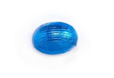 Blue easter egg isolated on a white backgroundの写真素材