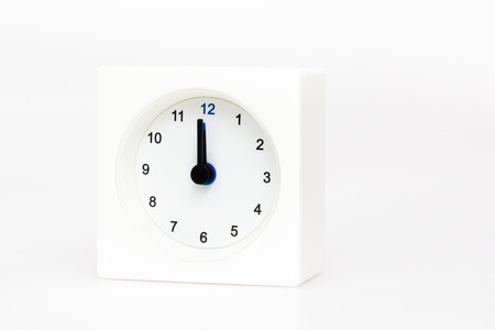 White Square clock isolated on white background. Time Twelve o'clockの写真素材