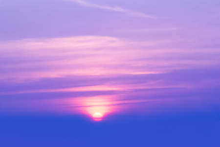 Beautiful tropical sunset background. Fantasy purple filtered shotの写真素材