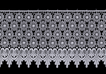 White Ornamental Lace isolated on black background