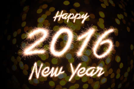 Happy new year 2016 written with Sparkle fireworkの写真素材