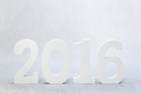2016 year white wood number with sparkling wall backgroundの写真素材