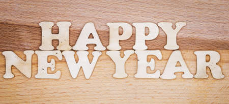 Happy New Year wooden  character on wooden background, Holiday conceptの写真素材