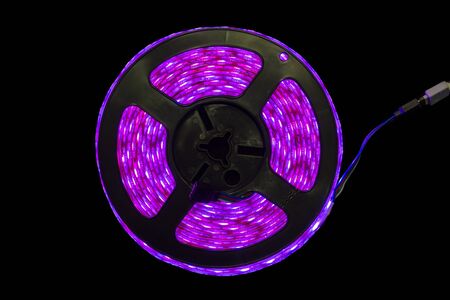 Led stripe light shining Purple strip in coilの写真素材