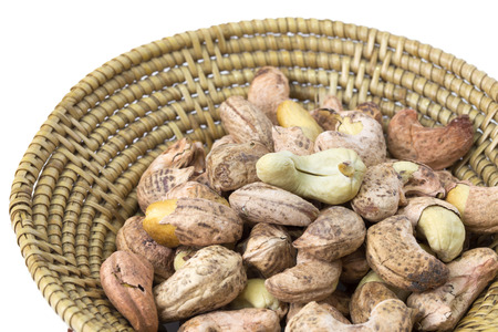 cashews nut with shell close-up in basket, Selective focusの写真素材