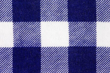Blue Fabric plaid texture dark blue and white. Cloth background
