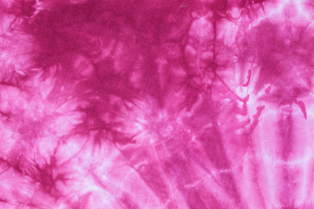 Pink Abstract tie dyed fabric batik background and textureの写真素材