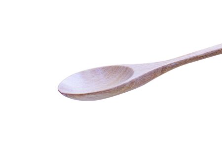Wooden spoon isolate on black backgroundの写真素材