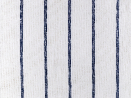 Blue and white striped fabric texture backgroundの写真素材