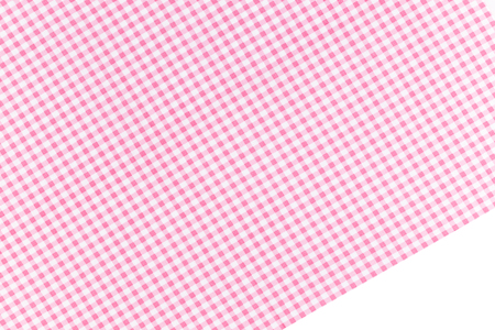 Pink and white plaid textile fabric background.の写真素材