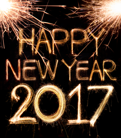 Happy new year 2017 written with Sparkle fireworkの写真素材