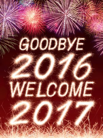 goodbye 2016 welcome 2017 written from Sparkle firework with firework backgroundの写真素材