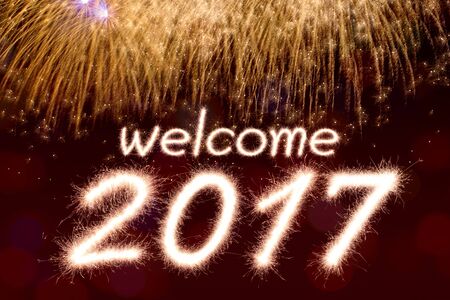 Welcome 2017 written from Sparkle firework with  Sparkle firework backgroundの写真素材