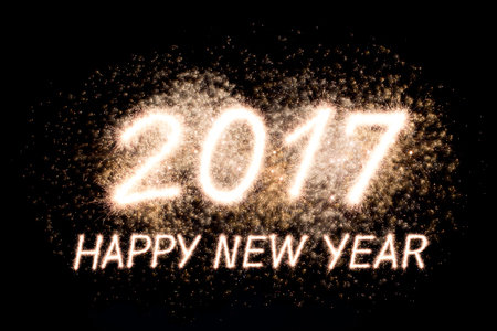 Happy new year 2017 written with Sparkle firework with firework background