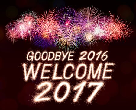 goodbye 2016 welcome 2017 written from Sparkle firework with firework backgroundの写真素材