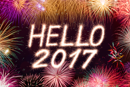 hello 2017 written from Sparkle firework with firework backgroundの写真素材