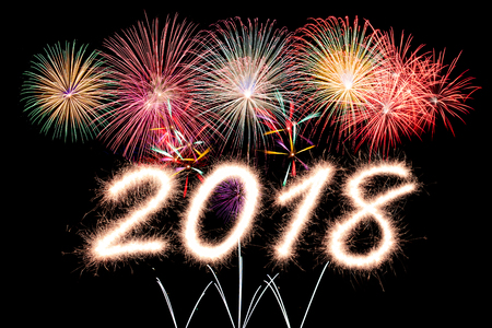 2018 written with Sparkle firecracker and fireworkの写真素材