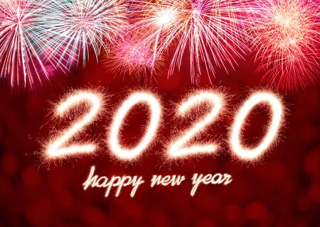 Happy new year, 2020 written with Sparkle fireworkの写真素材