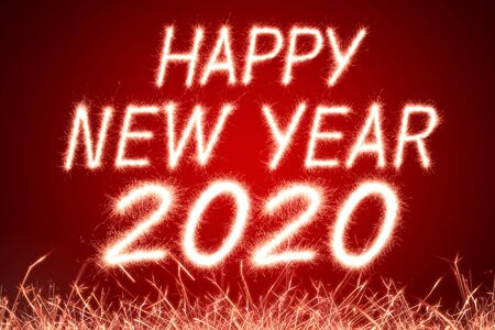 Happy new year, 2020 written with Sparkle fireworkの写真素材