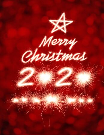 merry Christmas, 2020 written with Sparkle fireworkの写真素材