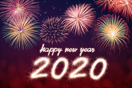 Happy new year, 2020 written with Sparkle fireworkの写真素材