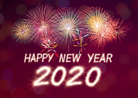 Happy new year, 2020 written with Sparkle fireworkの写真素材