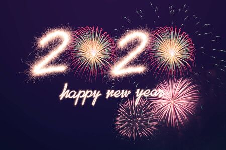 Happy new year, 2020 written with Sparkle fireworkの写真素材