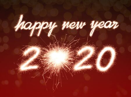 Happy new year, 2020 written with Sparkle fireworkの写真素材