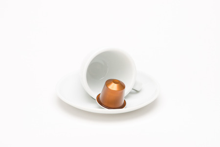 Cup of coffee with capsule on white backgroundのeditorial素材