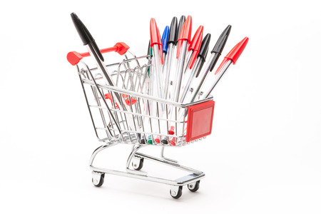 Caddy with school equipment on white backgroundの写真素材