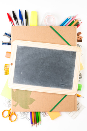 School equipment with slate on white backgroundの写真素材