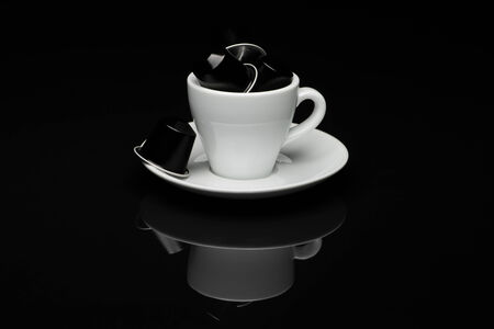Cup of coffee on black background with reflectionのeditorial素材