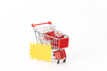 Caddy for shopping  with gift on white background