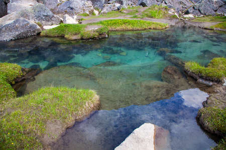 Crystal clear waters in an Alaska alpine streamの写真素材