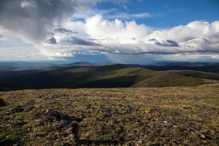 Rain storms hang over the high alpine tundraの写真素材