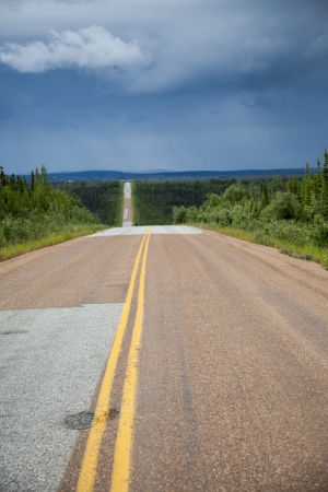 Rural highway in remote area of Alaskaの写真素材