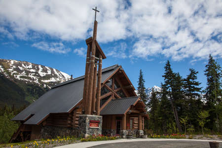 A log construction church sits in a remote Alaska townの写真素材