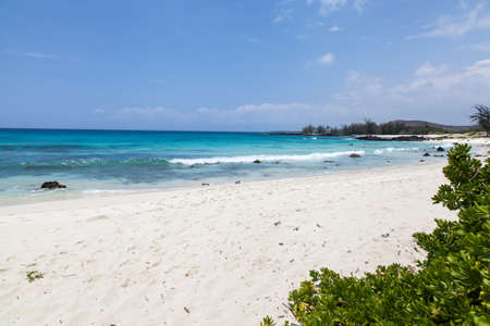 Perfect white sand and blue waters at an abandoned beachの写真素材