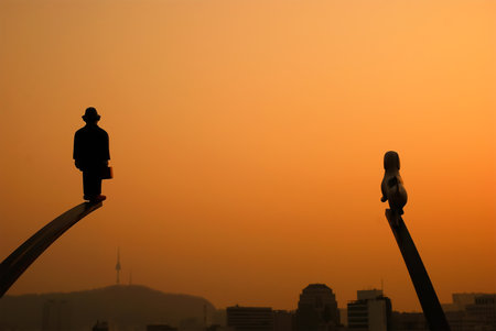 Silhouette of buddha statue at sunset, Bangkok, Thailandの写真素材