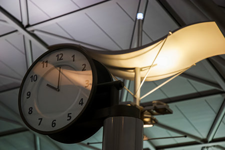 A clock in the interior of a modern building, close-upの写真素材