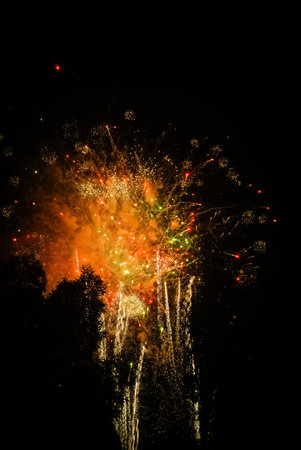 Fireworks on the black sky background. Colorful fireworks in the night sky.の写真素材