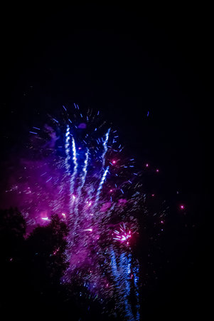 Colorful fireworks of various colors over night sky, celebration concept.の写真素材