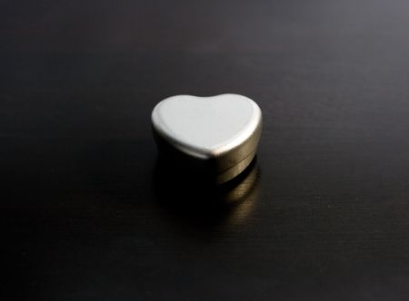 Metal gift box shaped like a heart.の写真素材