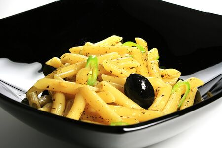 Close up of italian pasta recipe called Penne al oglio (shallow DOF !)の写真素材