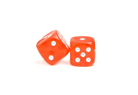 Red dice showing a seven, over whiteの写真素材