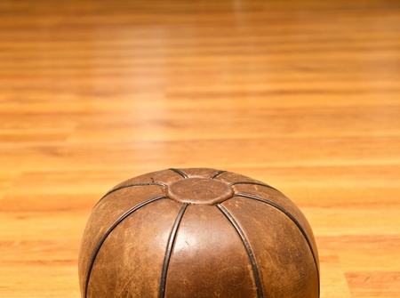 Medicinal leather ball on the gym floorの写真素材