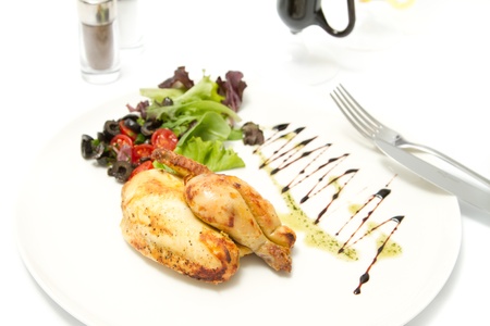 Chicken legs with salad asideの写真素材