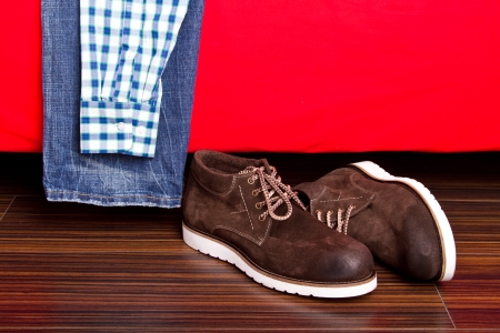 Shoes assorted with shirt and jeansの写真素材