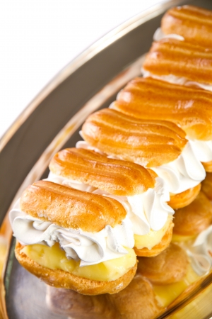 Mini cakes with vanilla pudding and cream