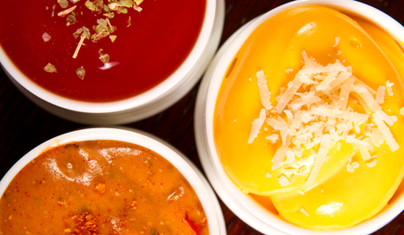 Three kinds of dips on a tableの写真素材